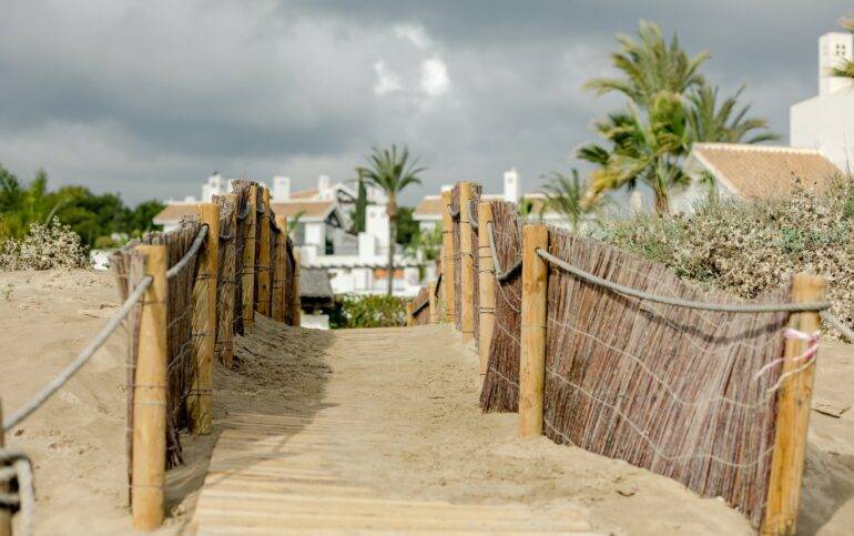 backyard gate to Marbella beach
